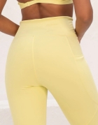 F393-LEGGING COM RECORTES COS ALTO COM BOLSOS, RECORTES EM X